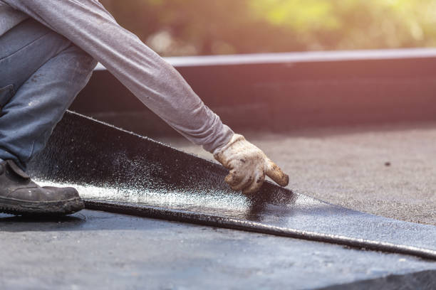 Professional Basement Waterproofing technician working in Beaver Dam, KY